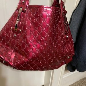 Large red handbag with braided straps